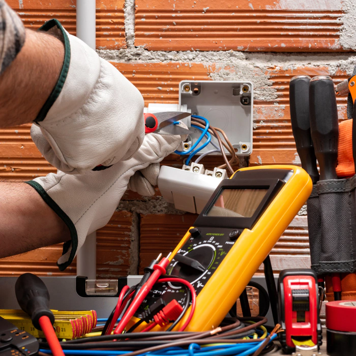 electrician doing an outlet installation mount holly nj